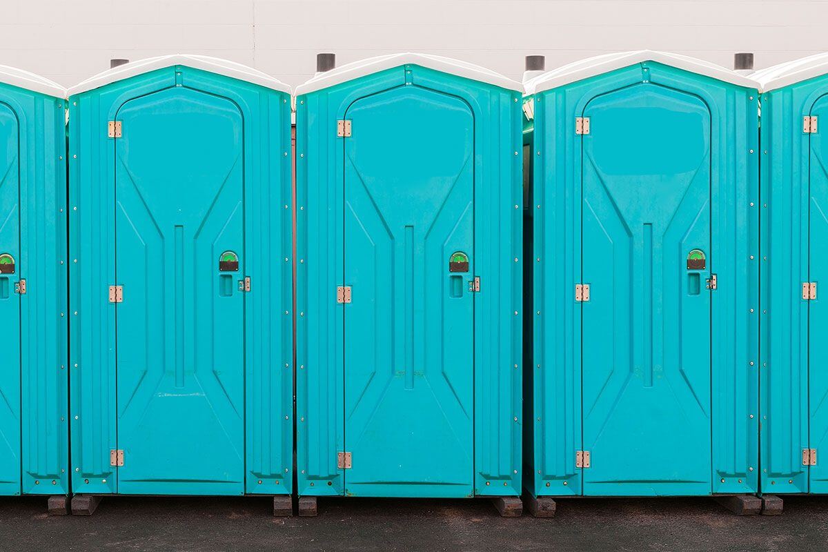 Industrial portable restroom units at a plant in Tyler, Texas